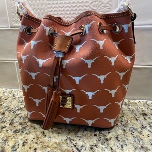 New with tags. University of Texas Dooney and Burke purse.